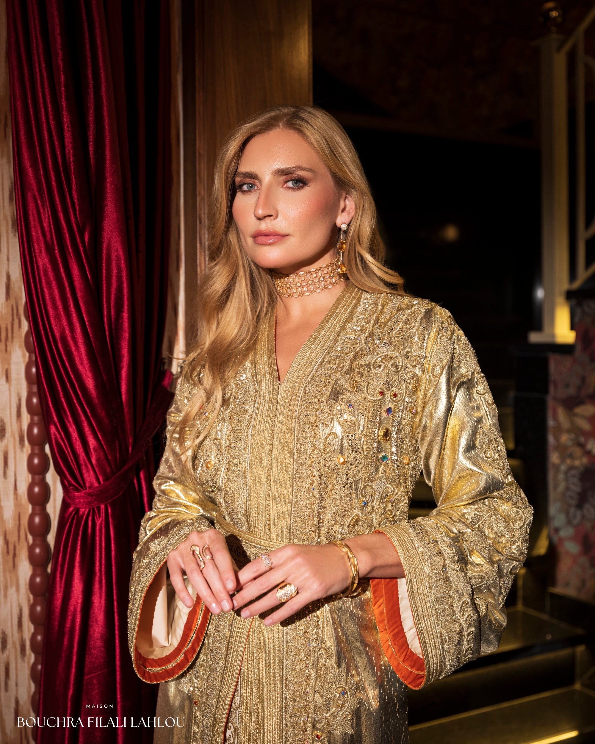 Luxury gold caftan dress with ornate embroidery and refined evening silhouette