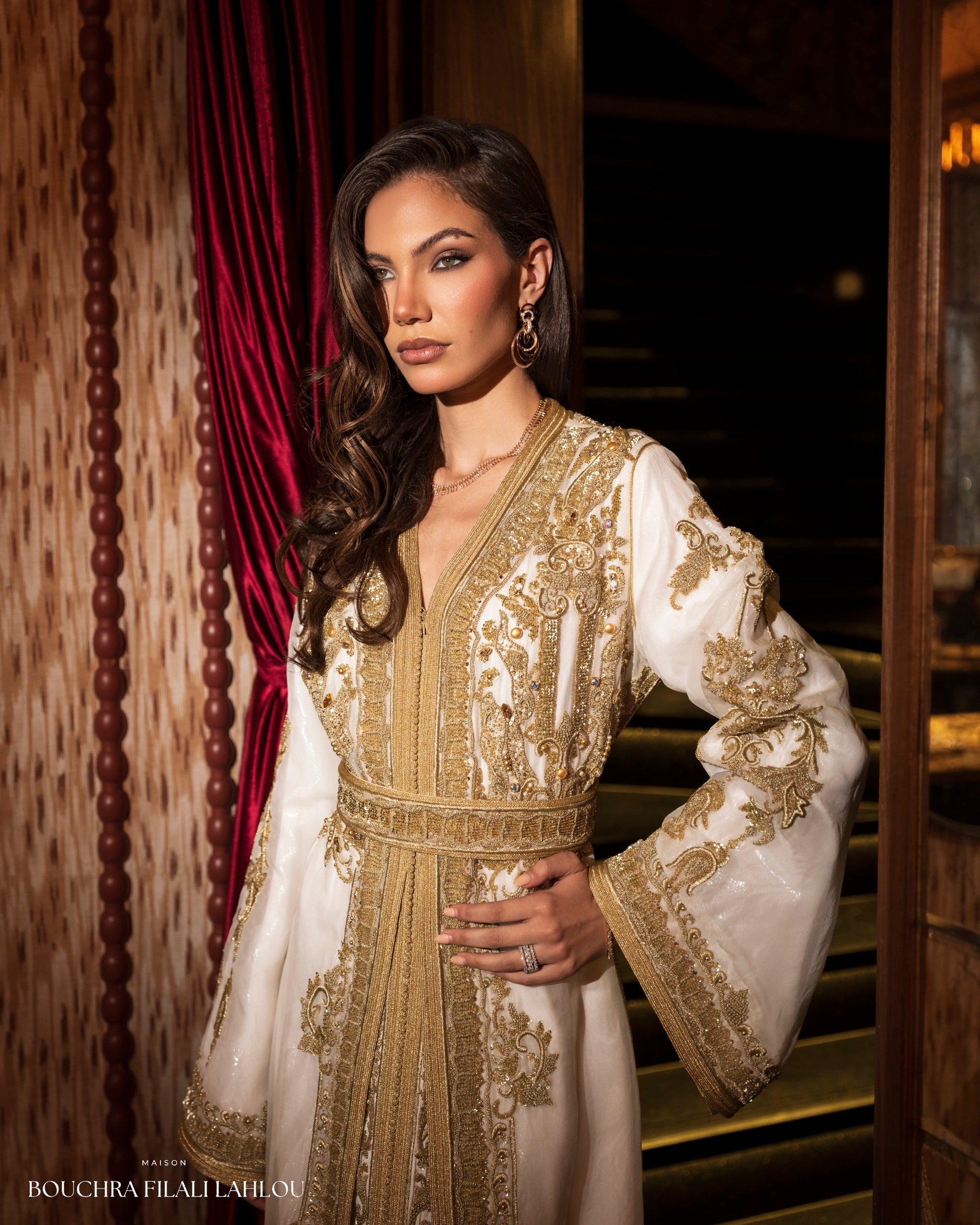 Ivory and gold Moroccan caftan detail with ornate embroidery and refined bridal silhouette