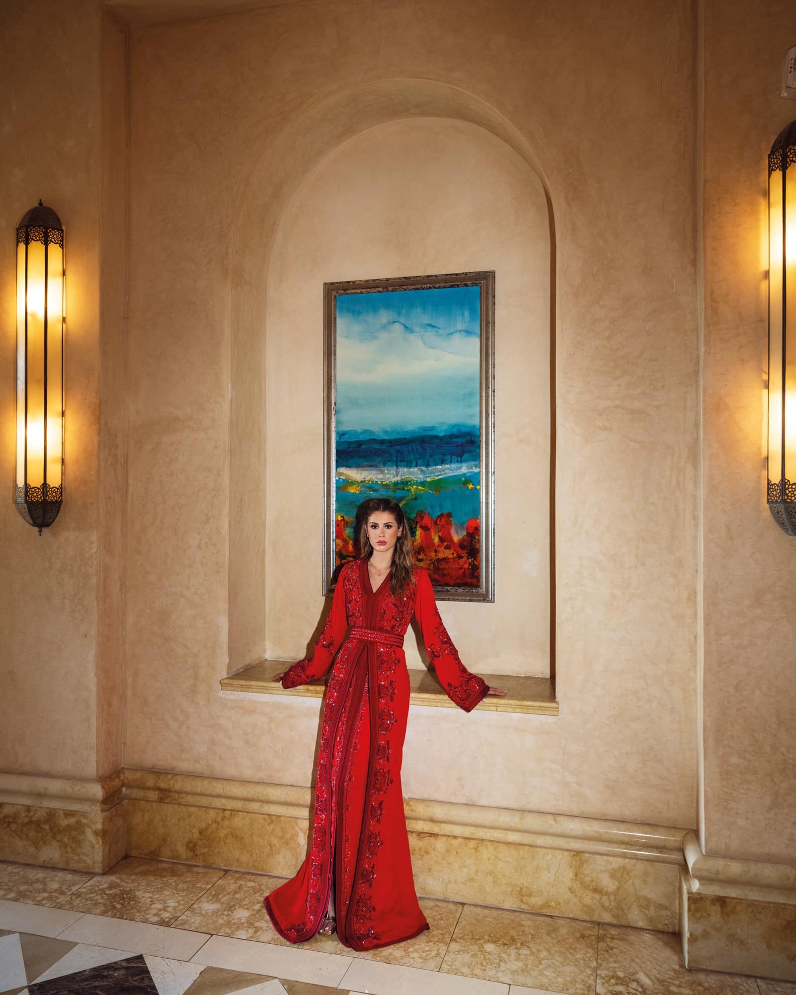 Red Moroccan kaftan with tonal embroidery and belted couture silhouette