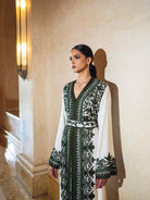 Ivory Moroccan kaftan with deep green embroidery and fluid sleeves