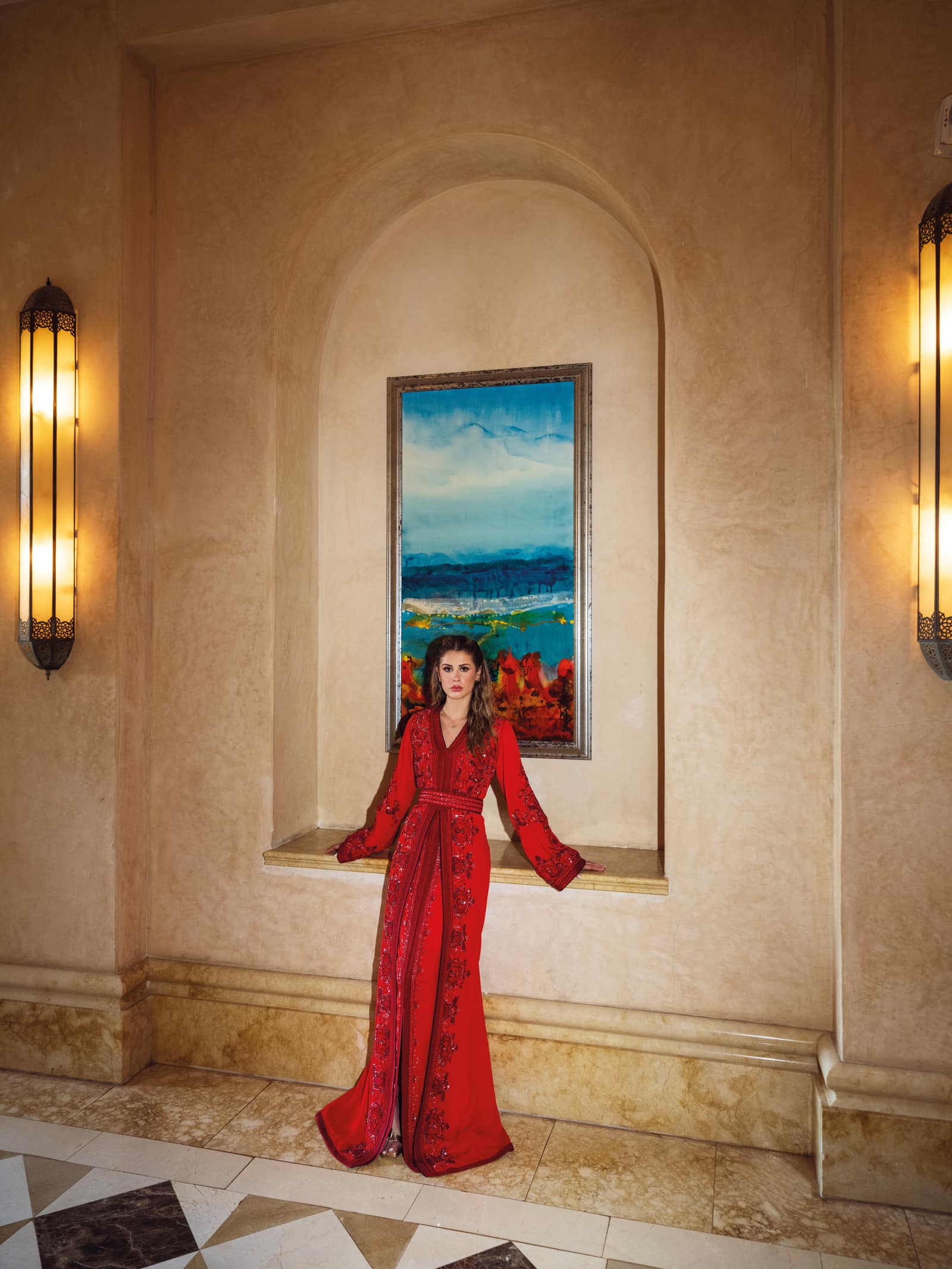 Red Moroccan kaftan with tonal embroidery and belted couture silhouette